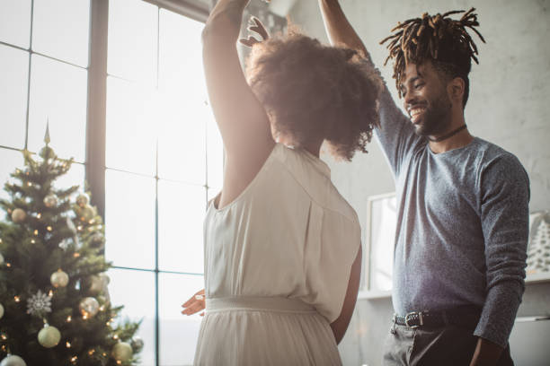 istock Couple dancing on Christmas 1183638108