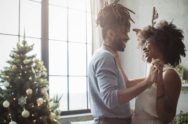 istock Couple dancing on Christmas 1183638122
