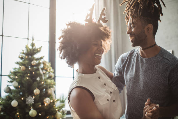 istock Couple dancing on Christmas 1183638125