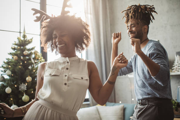 istock Couple dancing on Christmas 1183638128