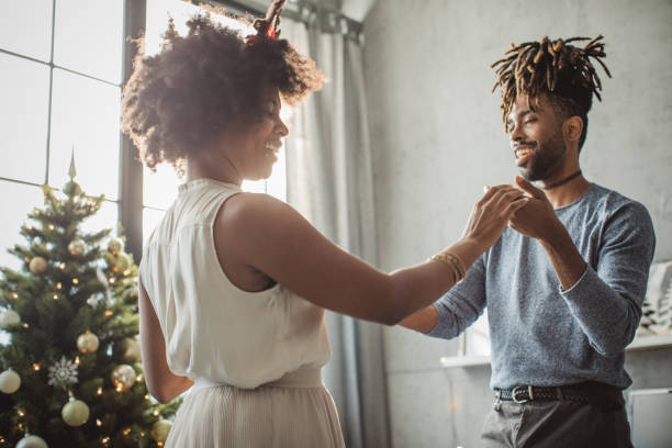 istock Couple dancing on Christmas 1183638133