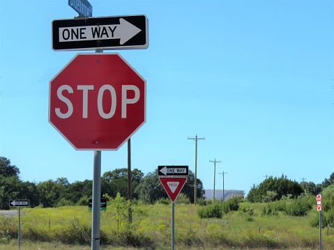 Single Rd. Stop Traffic Signs Stop One Way Yield Stock Photo - Download Image Now ...