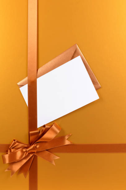 istock Gold gift with blank greetings card 118365010