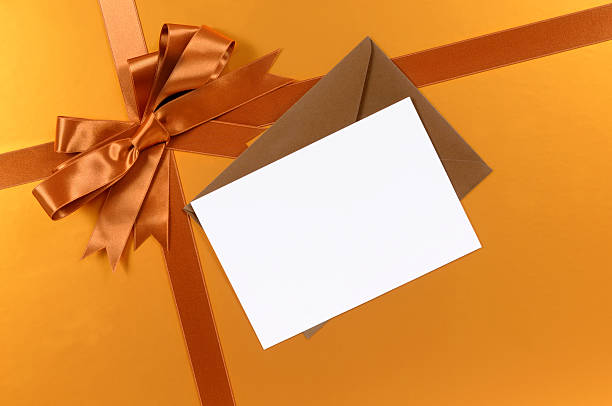 istock Gold gift with blank greetings card 118365011
