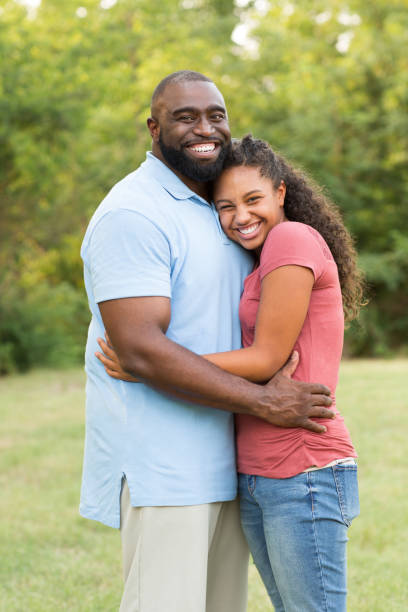 istock Father hugging his daughter 1183656522
