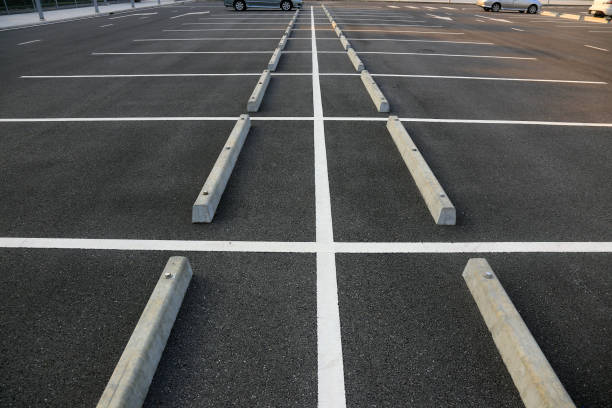 Empty parking with white marking line Empty parking with white marking line parking lot stock pictures, royalty-free photos & images