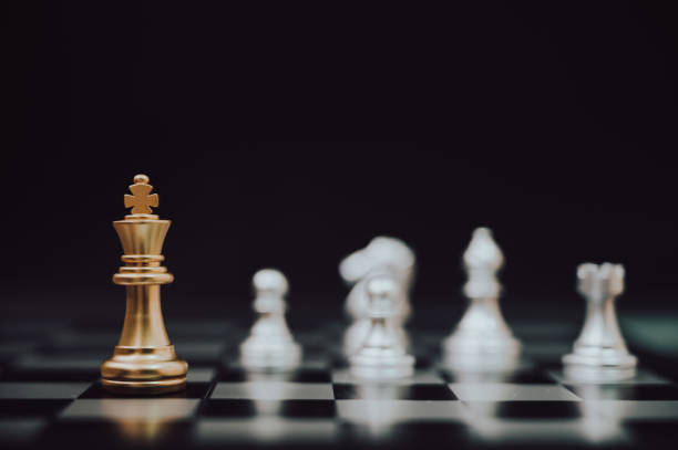 istock Business leader concept. Chess board game strategy planning and competition 1183670299
