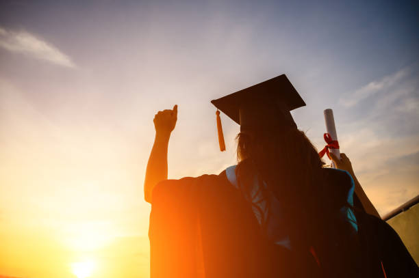istock Graduates wear a black hat to stand for congratulations on graduation 1183672829