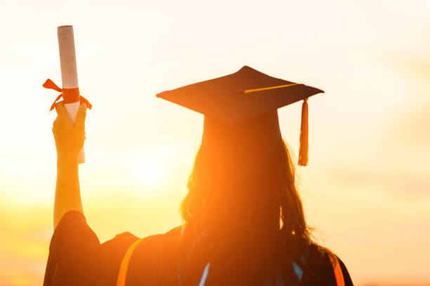 istock Graduates wear a black hat to stand for congratulations on graduation 1183672836