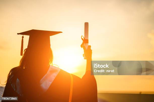 Graduates Wear A Black Hat To Stand For Congratulations On Graduation Stock Photo - Download Image Now