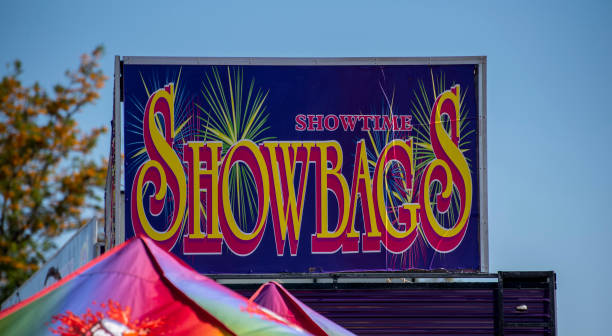 istock fairground boardings above a portable shop. 1183673499