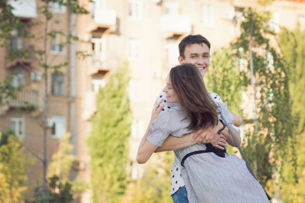 istock Lovers walk in the summer park 1183687217