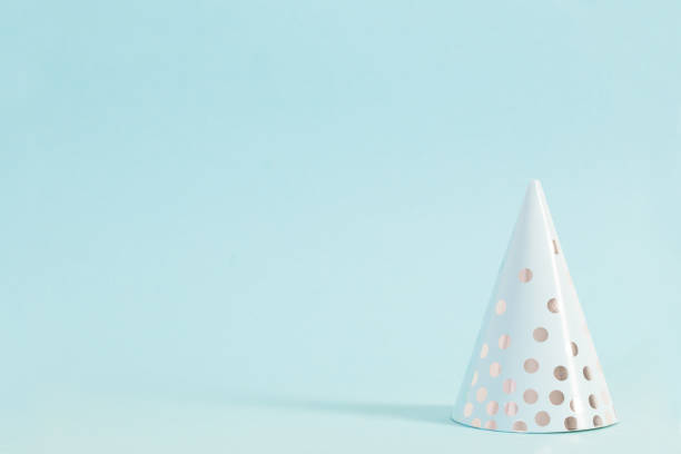 istock paper Christmas tree on blue background 1183692370