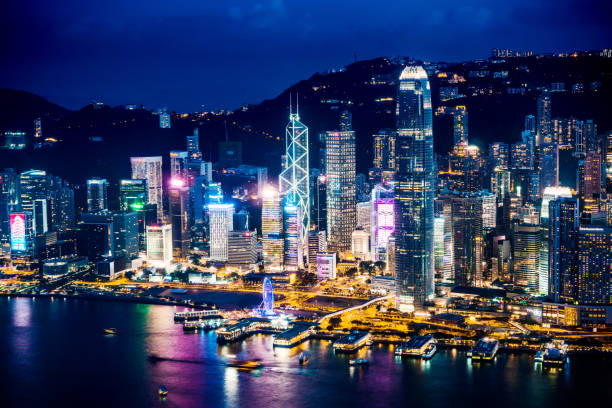 istock Hong Kong night viewed from Victoria harbor 1183697128
