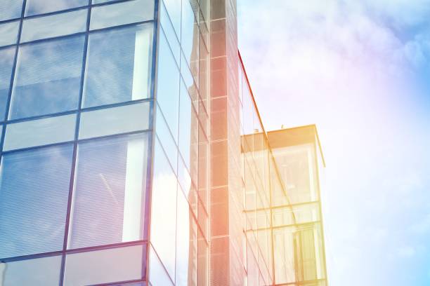 istock Modern office building detail, glass surface with sunlight 1183700723