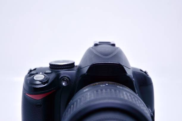 istock Digital photo camera isolated on bright background 1183700916