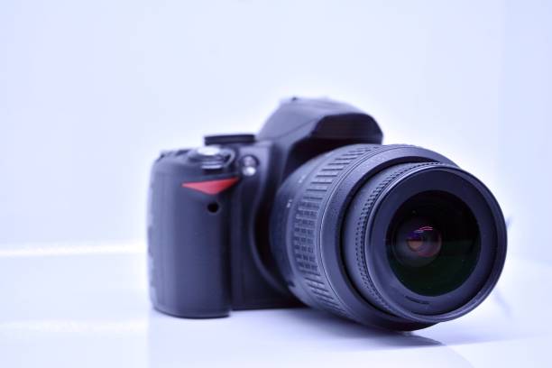 istock Digital photo camera isolated on bright background 1183700932