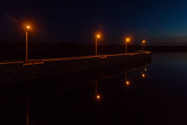 istock Lights on the mooring wall of the floodgate 1183703232