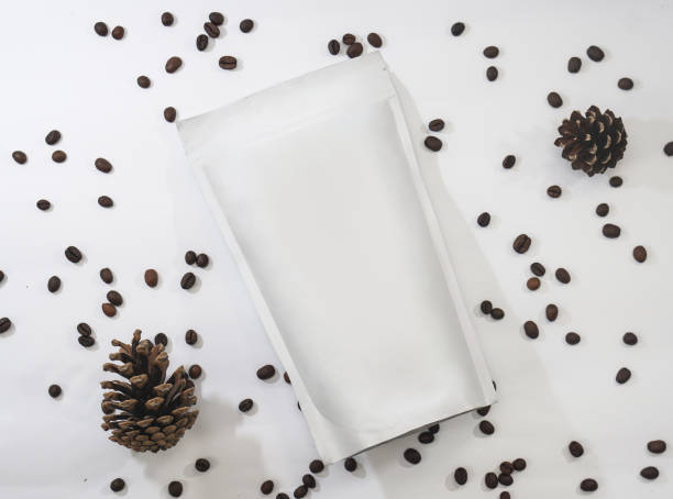 Template of paper ecological bag for storing coffee, tea on an isolated white background. Vacuum packaging for christmas and new year present stock photo