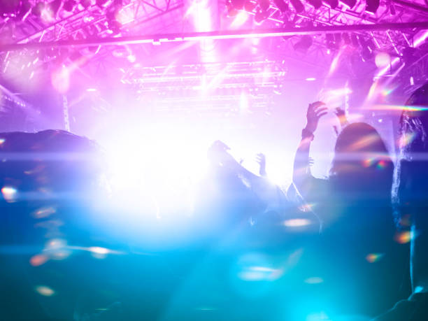 istock Concert crowd in front of a live stage 1183705791