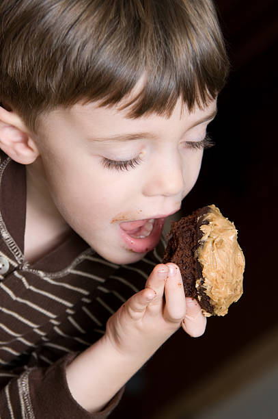 Child Eating Cupcake