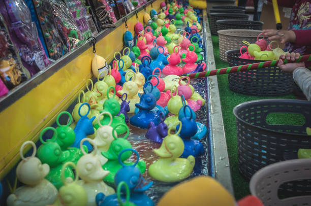 istock Rubber colorful ducks with hooks in their heads (funfair ducks) 1183707908