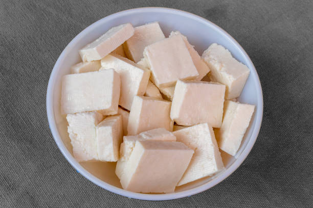 Paneer cottage cheese close up Paneer cottage cheese close up, slice pieces of homemade fresh white raw panner cheese. singh stock pictures, royalty-free photos & images