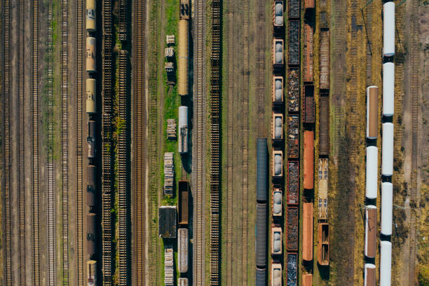 istock Top view of colorful cargo trains. 1183708116