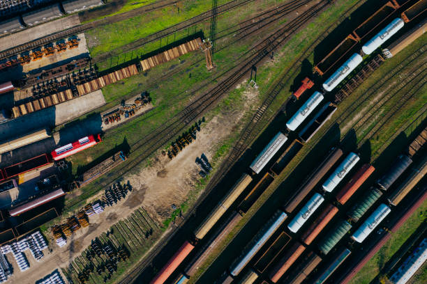 istock Top view of colorful cargo trains. 1183708125