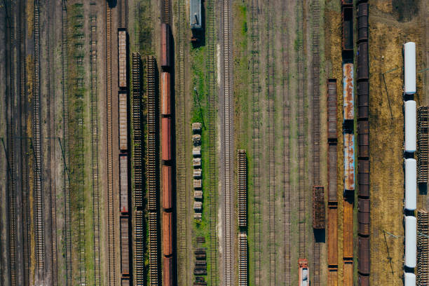 istock Top view of colorful cargo trains. 1183708130