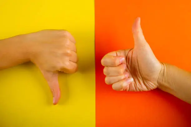 Photo of Like and dislike hands.