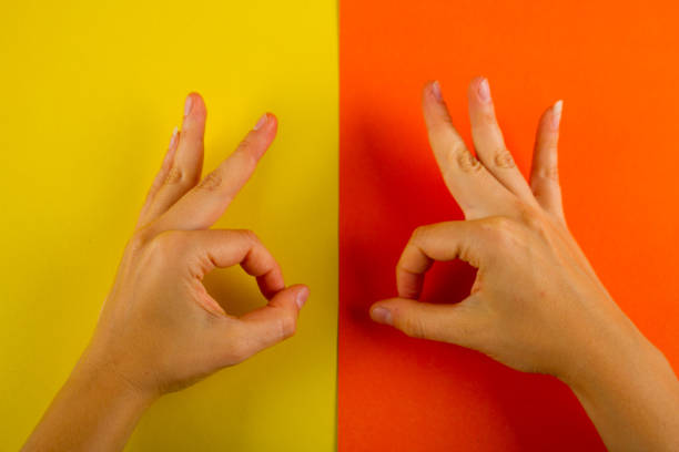 istock Ok gesture on colorful background 1183708979