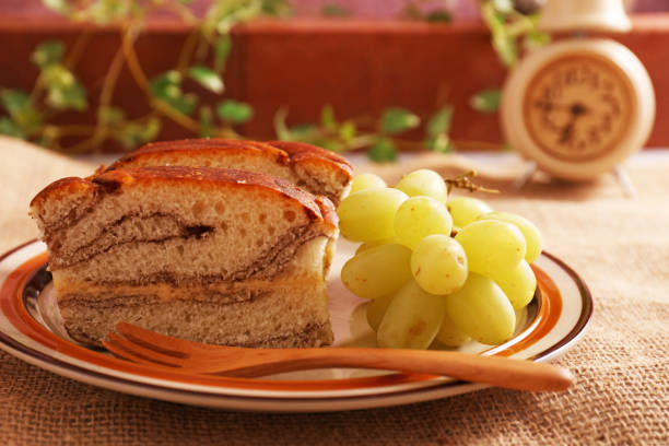 Tasty breads and fresh fruits on a dish