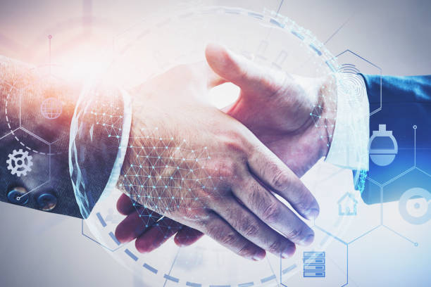 istock Handshake of businessmen, hi tech interface 1183716794