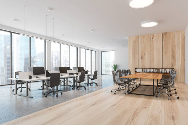 istock White and wooden panoramic office and meeting room 1183718632