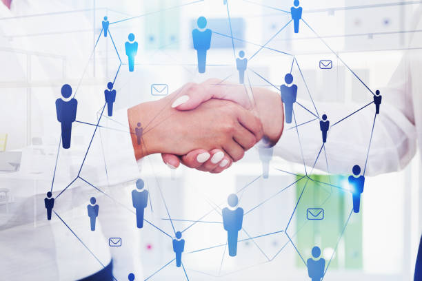 istock Businesswomen shaking hands, social network 1183718827