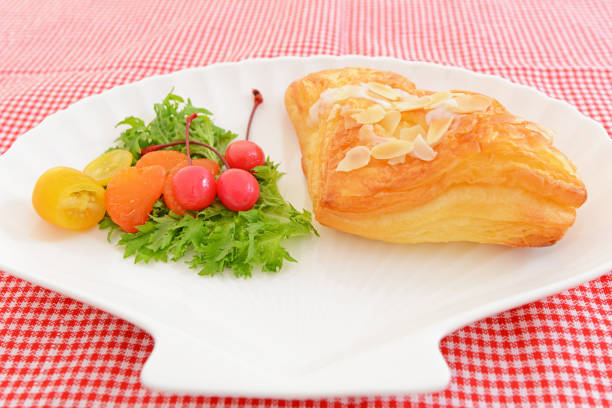 Delicious sweets and fresh fruits on a dish