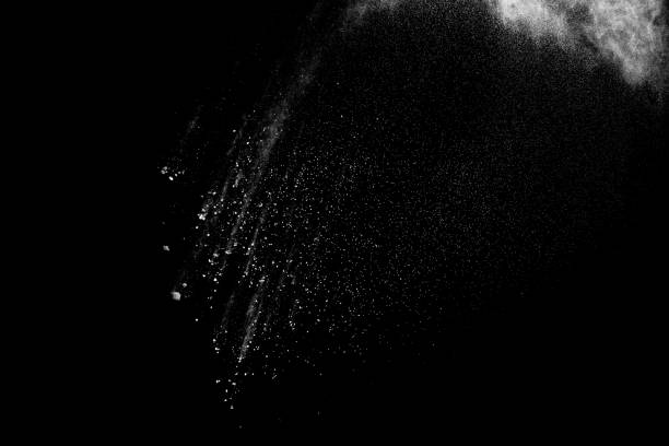 istock White powder explosion clouds.Freeze motion of white dust particles on black background. 1183719948