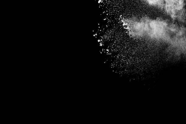 istock White powder explosion clouds.Freeze motion of white dust particles on black background. 1183719961