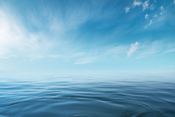 istock Blue sea or ocean with sunny and cloudy sky 1183721021