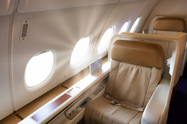 istock First class or business seat on airplane. 1183723419