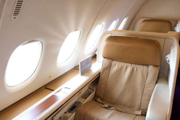 istock First class or business seat on airplane. 1183723446