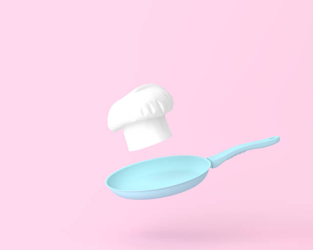 istock Hat chef floating with blue pan on pastel pink background. minimal  concept. An idea creative to produce work within an advertising marketing communications or artwork design. 1183724963