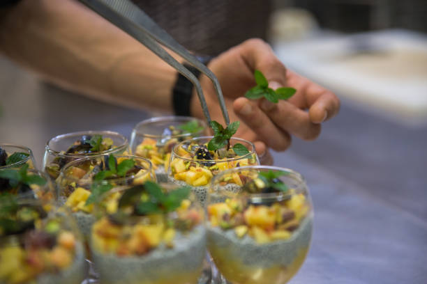 istock Chef preparing a healthy dessert, chia mango pudding, vegan dessert 1183728983