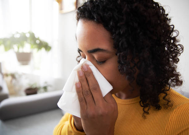 istock Woman With a Runny Nose 1183731786
