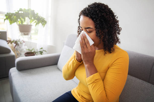 istock Woman With a Runny Nose 1183731793