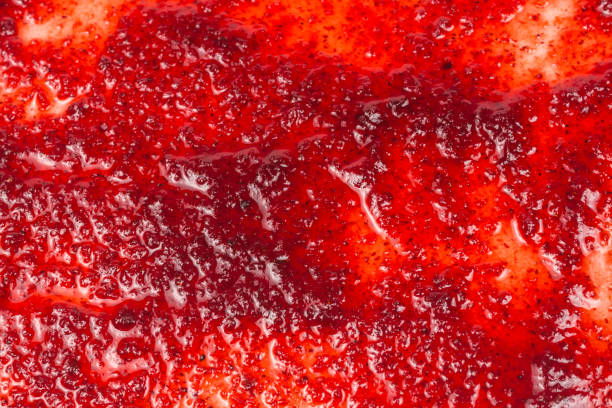 istock Red sweet jam background. Top view. 1183733328