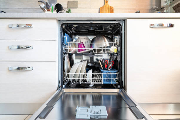 istock Opened dishwasher with clean dishes 1183734184
