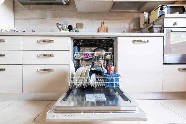 istock Opened dishwasher with clean dishes 1183734189