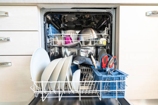 istock Opened dishwasher with clean dishes 1183734195